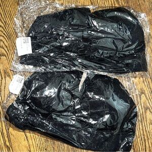 2 pairs of black sport bras